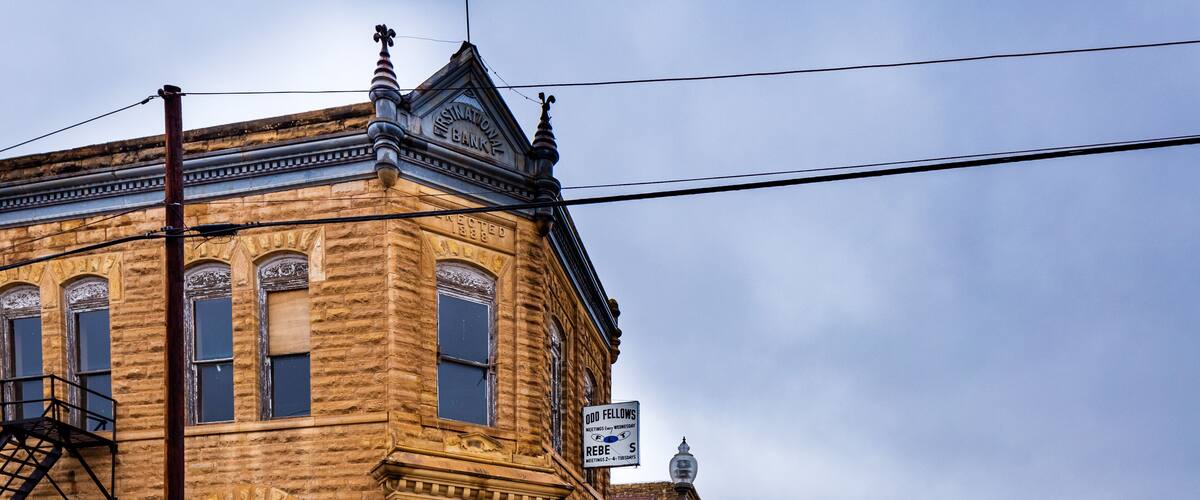 Beautiful limestone buildings from the late 1880s still form the core of rural downtown Jetmore, Kansas.