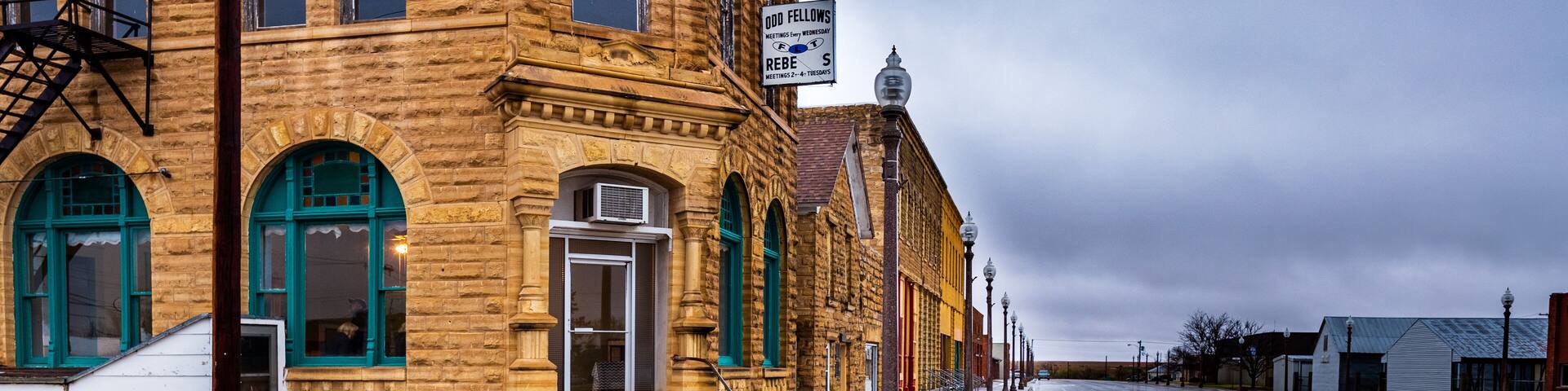 Beautiful limestone buildings from the late 1880s still form the core of rural downtown Jetmore, Kansas.
