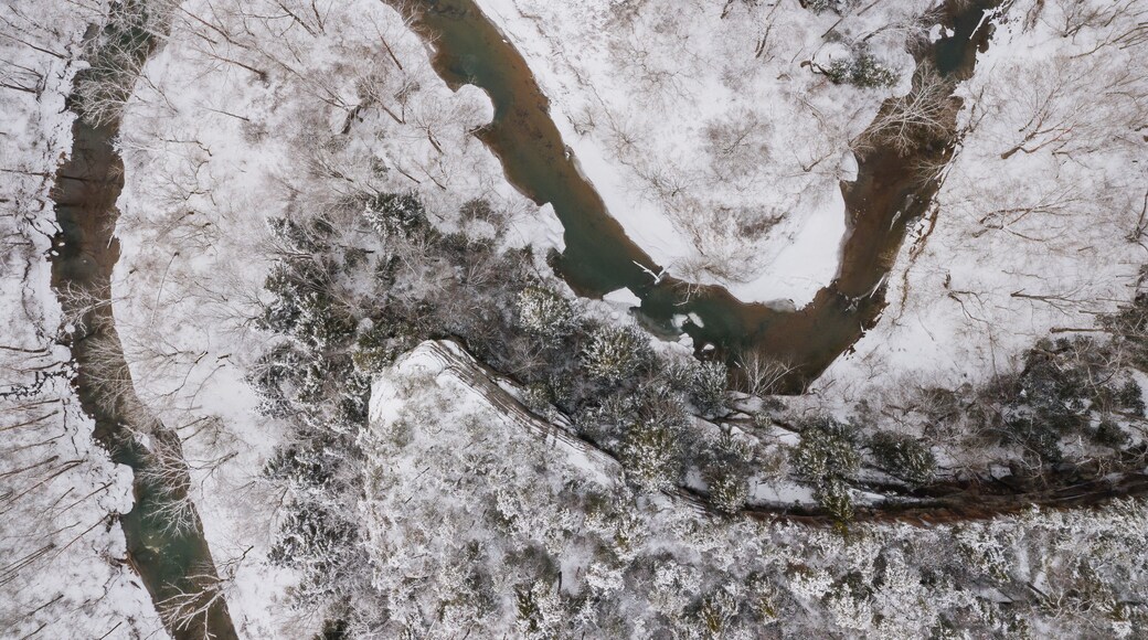 Aerial of Snow Covered Laurel Gorge with Winding Little Sandy River and Sandstone Cliffs Visible - Appalachian Mountains of Eastern Kentucky