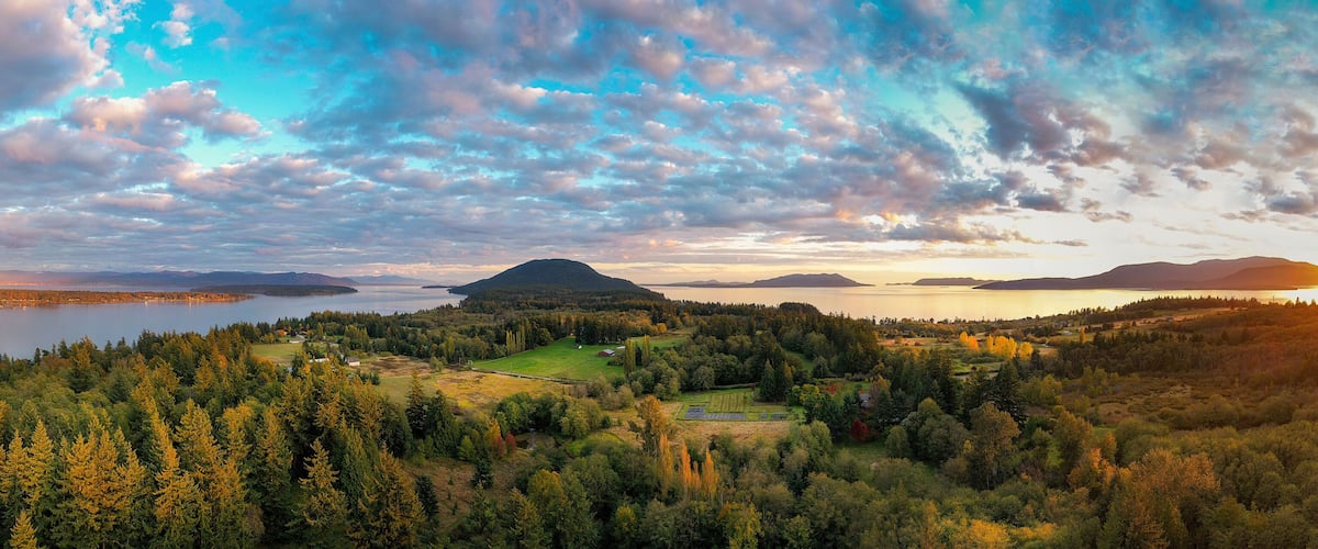 Sunset Aerial View of Rural Lummi Island, Washington. Located in the Puget Sound area of Washington state this rural island offers a peaceful retreat and boasts the famous award winning Willows Inn.