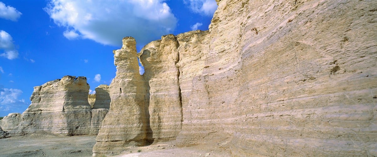 USA, Kansas, Logan County, Monument Rocks. The striated limestone of Monument Rocks form a thick wall, in Logan County, Kansas.