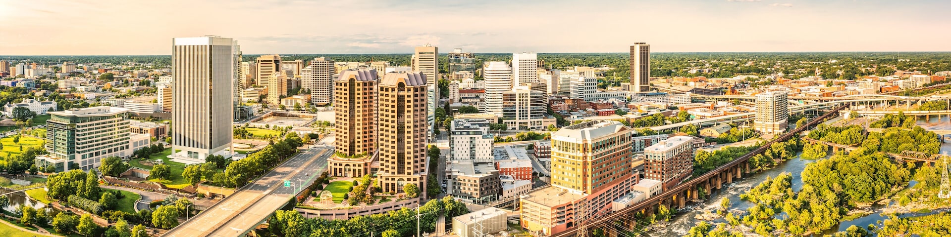 A cityscape with a river, bridges, and various buildings.