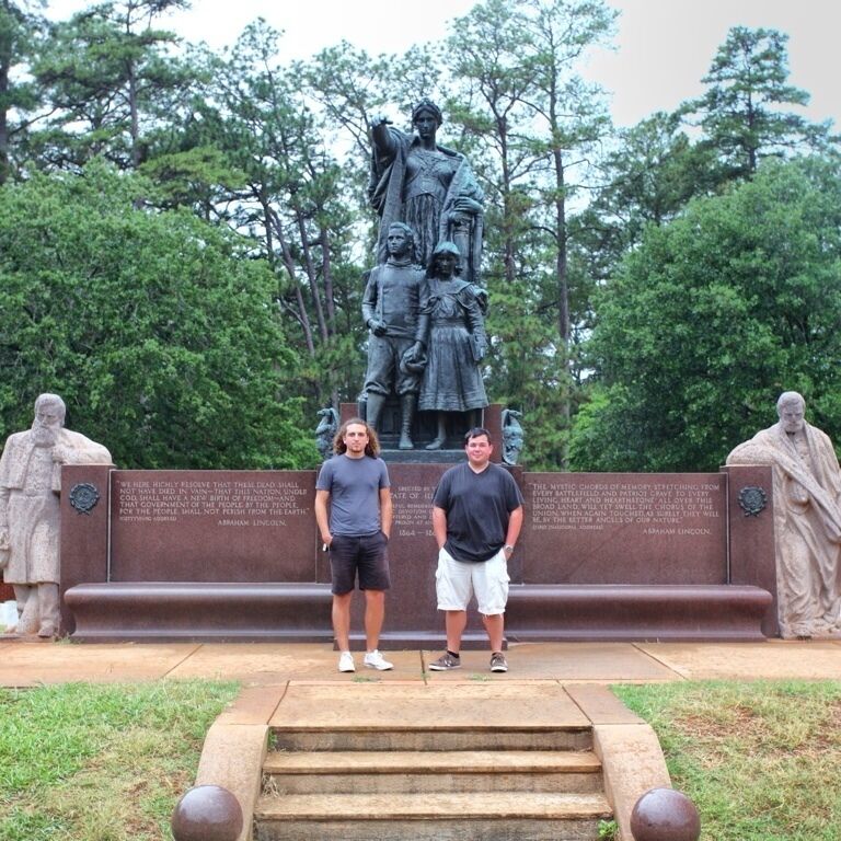 In 1907 the legislature of the State of Illinois authorized a monument in memory of the state's 889 known dead at Andersonville.

The final design was the result of a collaboration between sculptor Charles Mulligan and state architect Carbys Zimmerman. The monument features a base and pedestal of Montello granite. The monument commission described the monument as consisting of:

The large figure of Columbia, and beside her Youth and Maiden, representing nations to come, is cast in bronze and stands upon a pedestal of massive Montello granite. Columbia with outstretched hand is pointing to the heroes resting in their graves. Youth and Maiden, listening, gaze in the direction Columbia is pointing. On either wing of the pedestal is carved in bold letters the last clause of President Lincoln's first inaugural address and the last clause of his memorable speech on the battlefield of Gettysburg. The two figures on either side of the pedestal represent veterans of the Civil War standing in sad reflection of memories of the tragedies of the late war. These figures are of Montello granite, the same as the pedestal. The pedestal is 20 feet by 24 feet while the monument stands 18 feet overall.

On December 20, 1912 the Illinois monument was dedicated in the southwest portion of Andersonville National Cemetery.