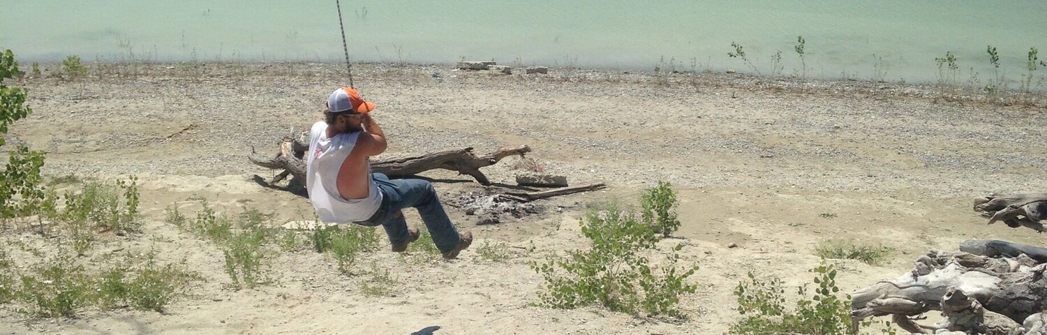 Small lake but lots of fun. Rope swing, which would be more fun if the water was higher. There is enough room to water ski, and several species of fish as well.