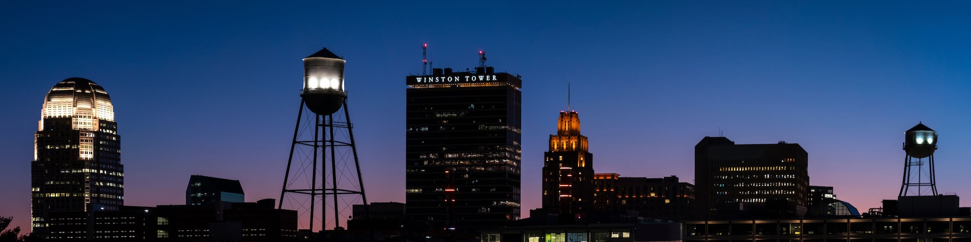 Panorama of the Winston Salem skyline against a beautiful night sky