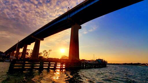 Sunset under Theo Baars Bridge, in Perdido Key, Florida, Intracoastal Waterway