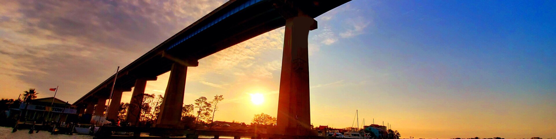 Sunset under Theo Baars Bridge, in Perdido Key, Florida, Intracoastal Waterway