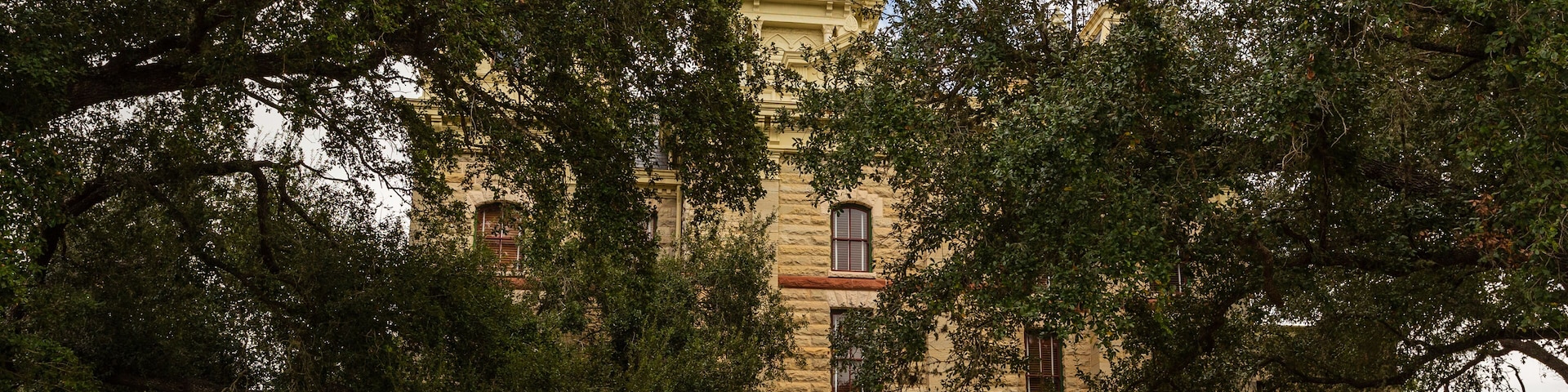 Built in 1894 of local, rough-cut limestone, the Goliad County (Texas) Courthouse is still in active use today