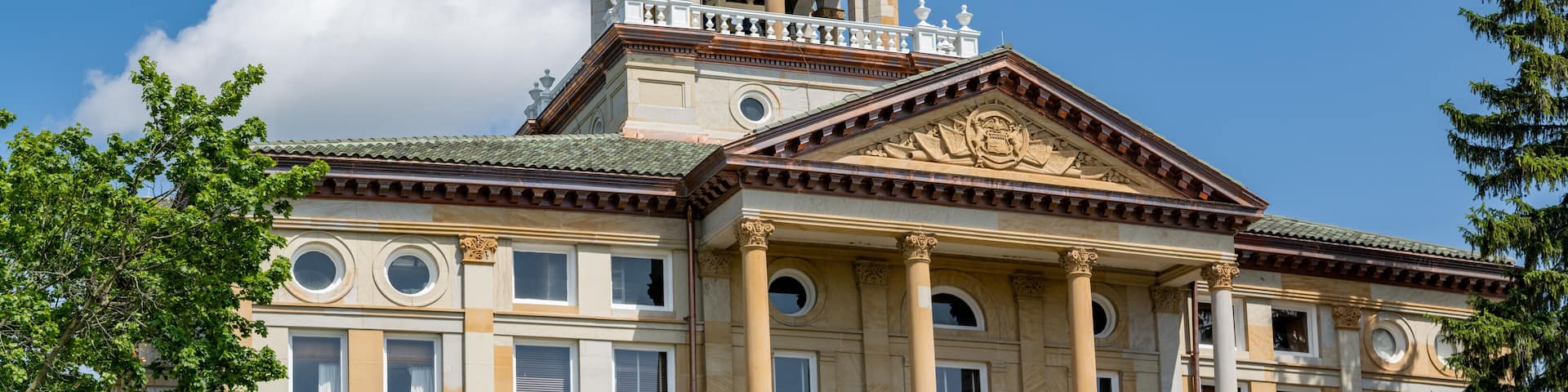 Hillsdale County Courthouse in Michigan with Blue Skies and Clouds