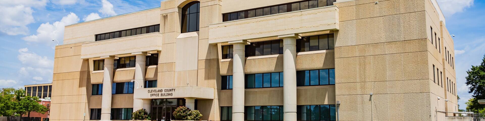 Sunny exterior view of Cleveland County Office Building