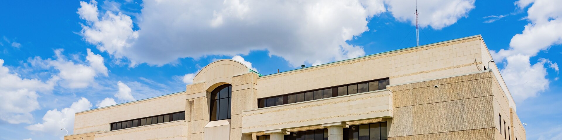 Sunny exterior view of Cleveland County Office Building