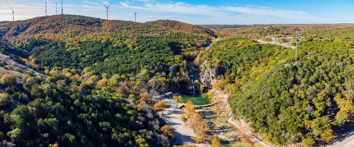 Sunny view of the fall color of Turner Falls