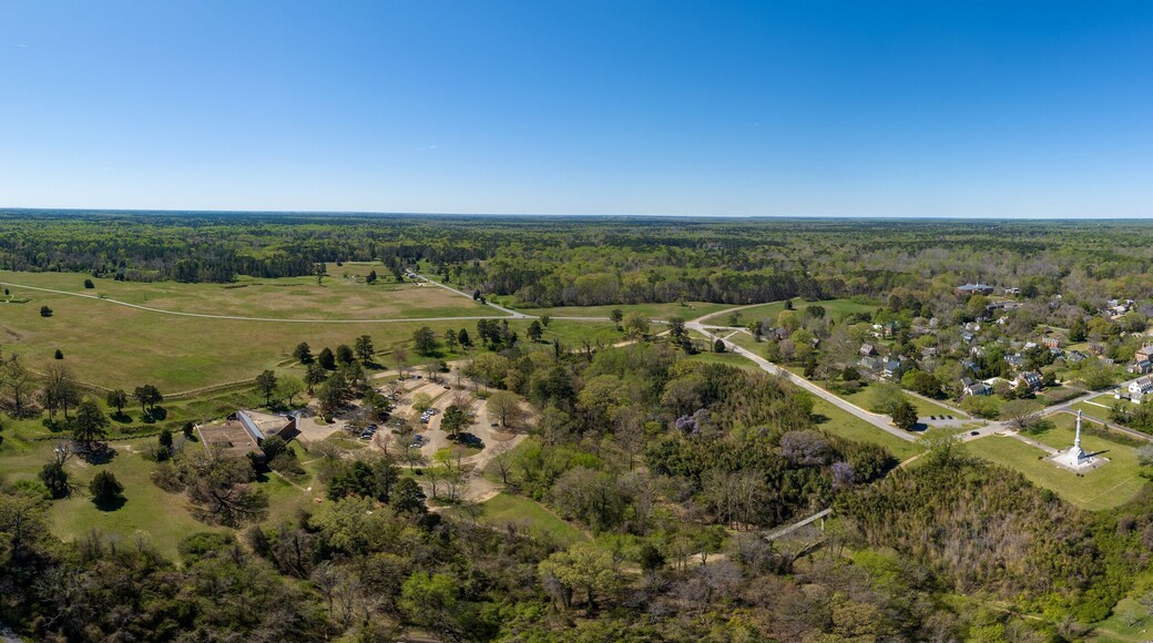 Aerial view of Yorktown revolutionary war battlefield with earthwork ramparts, siege positions, battlefield memorial