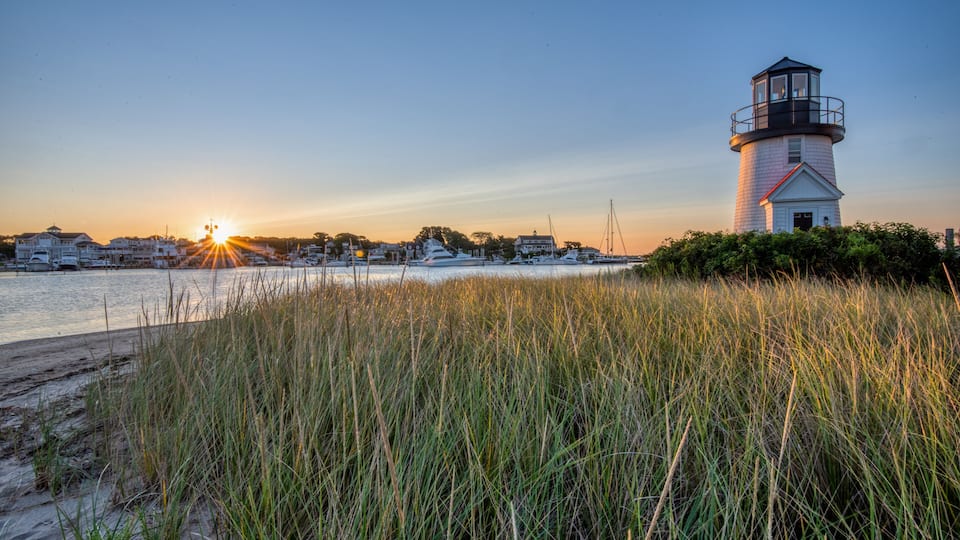 Originally a lamp was hung in the window of a shack to guide mariners around Hyannis Harbor until the Hyannis Harbor Lighthouse was built in 1849.