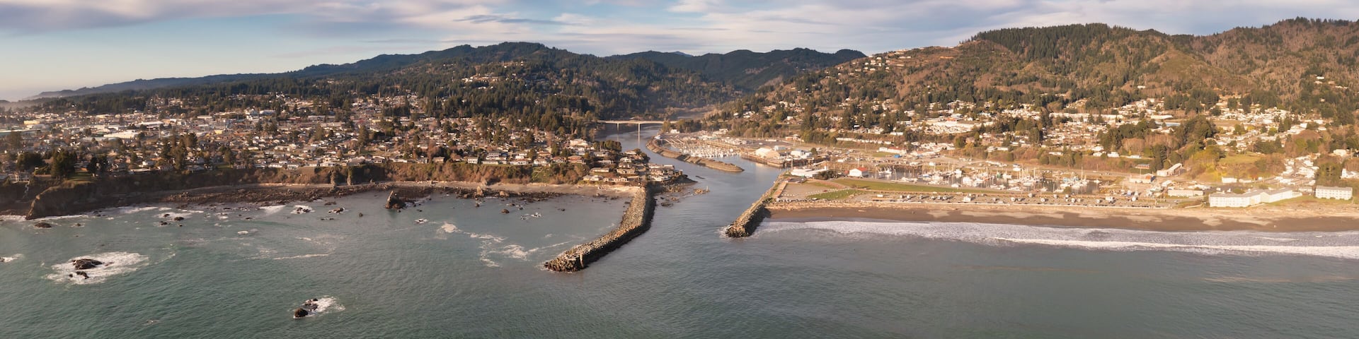 Brookings, Oregon, USA. Panorama of harbor entrance and mouth of Chetco River