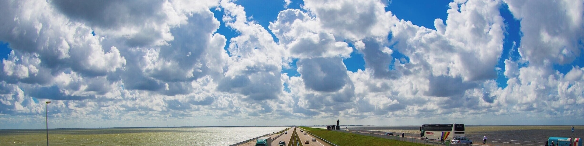 We traveled across Afsluitdijk while touring in the Netherlands. It was truly impressive to see how the small nation has kept the sea at bay (no pun intended). At this stop near the middle of the structure, there is some history that explains how each stone was installed by hand, along with a great many other impressive metrics. Worth the trip.