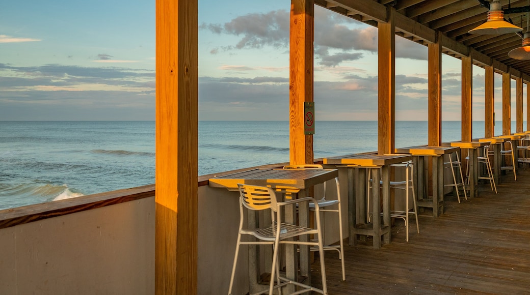 Daytona Beach Pier showing general coastal views and a sunset
