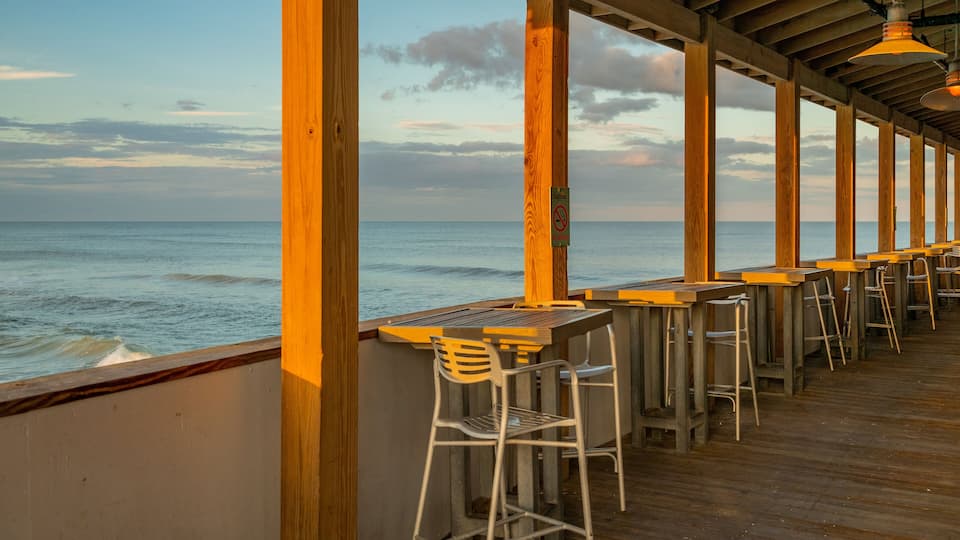 Daytona Beach Pier showing general coastal views and a sunset