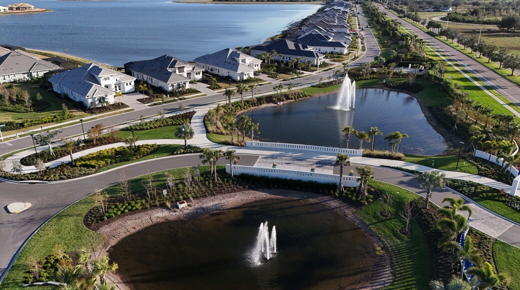lakes and fountains at the entryway to an exclusive luxury gated subdivision in Lakewood Ranch, Florida