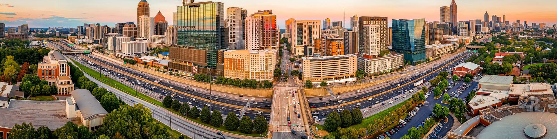 Atlanta Skyline and Highway at Sunset with Midtown Towers and Urban Traffic