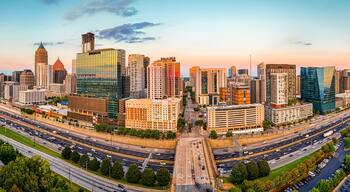 Atlanta Skyline and Highway at Sunset with Midtown Towers and Urban Traffic