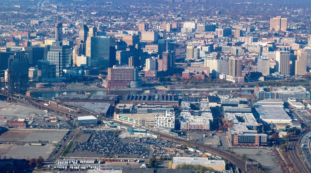 Aerial view of Newark, New Jersey shows a dense urban landscape with a mix of modern skyscrapers and older buildings.