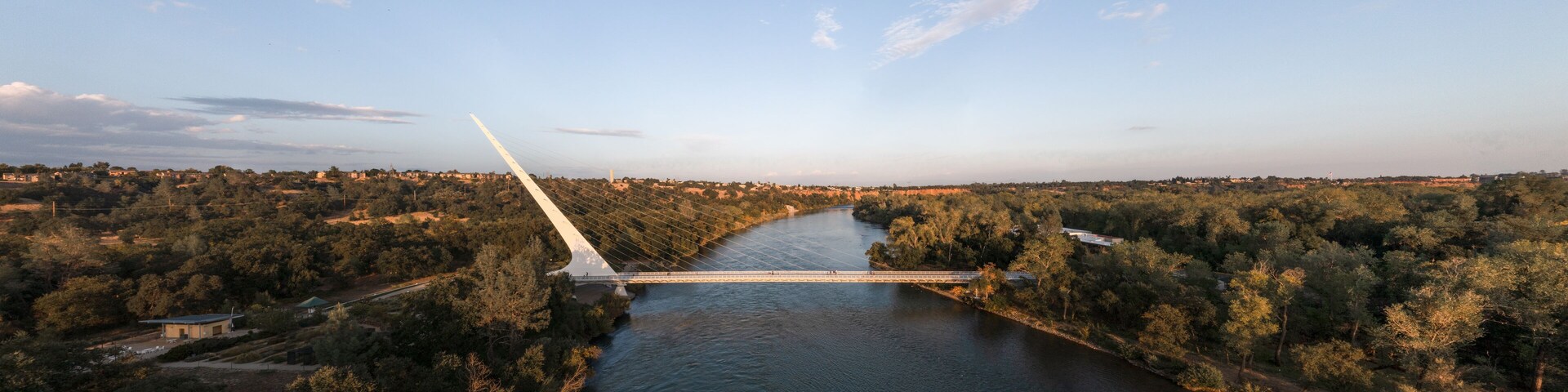 Sundial Bridge at Turtle Bay that crosses the Sacramento River in Redding - Aerial drone panorama photo