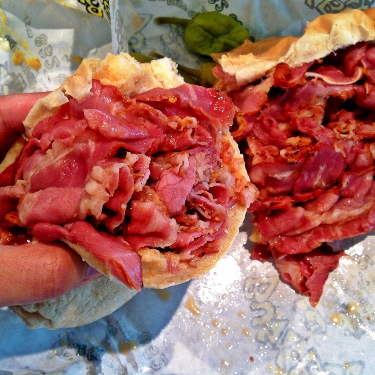 Hot double pastrami sandwich. They warm up the cold pastrami cuts in the hot seasoned broth before they make sandwich so the meat is still very juicy and not over cooked. The bread is freshly made as well. 