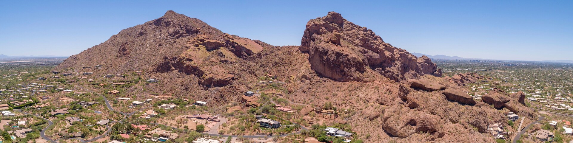 This is a 4 image aerial panoramic of iconic Camelback Mountain in Phoenix, Arizona, USA