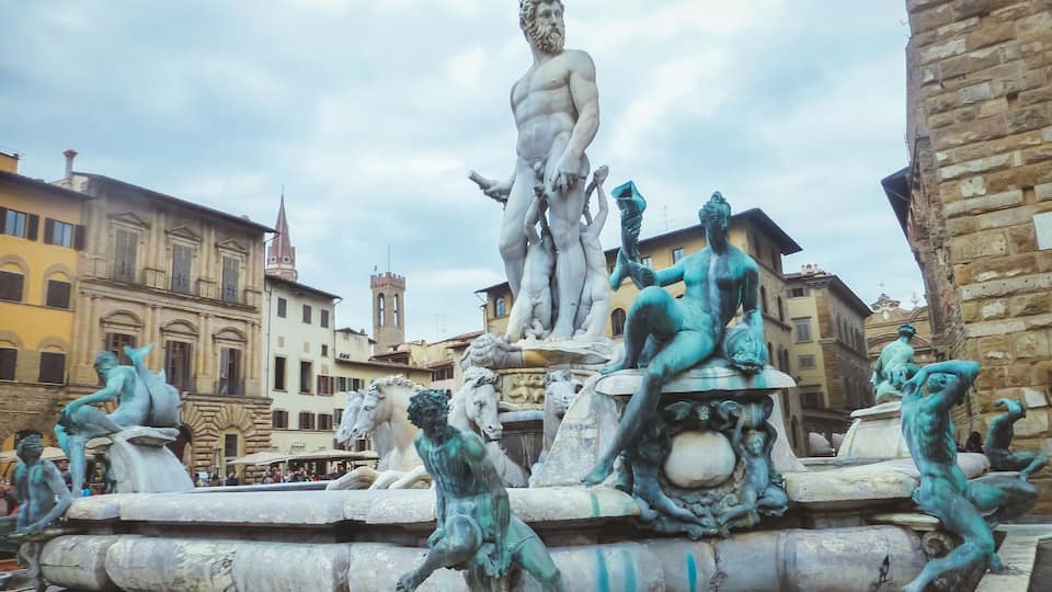 Water fountain with statues in Florence, Italy