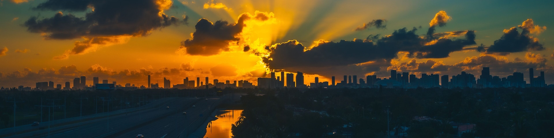 beautiful yellow color sunlight city architecture nature sunrise sunset sun sky cloud dusk landscape lighting miami florida orange blue horizon lake dawn early twilight water town buildings river skys