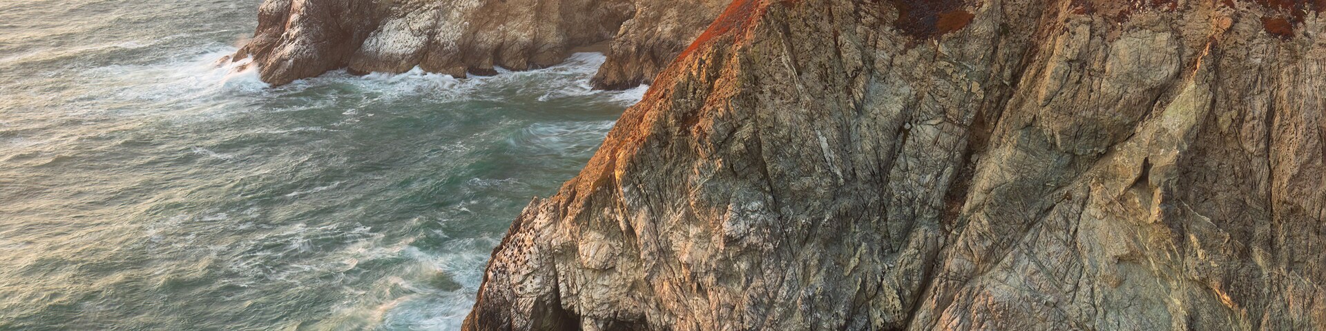 The sheer cliffs of Devil's Slide promontory, San Mateo County Coast between Montara and Pacifica in California.