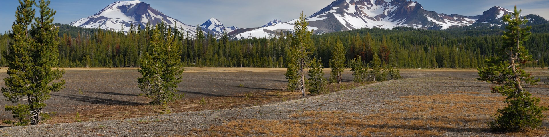 Panorama of Three Sisters and Broken Top mountains from Dutchman Flat
