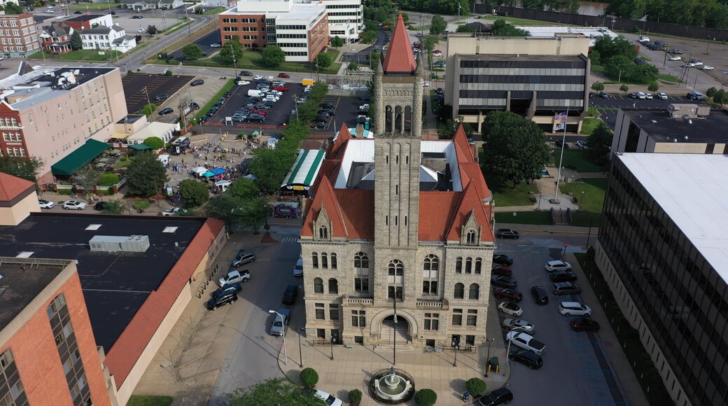 Vibrant aerial perspective of Parkersburg, West Virginia, highlighting historic buildings, the bustling downtown area, and the natural beauty along the Ohio River.