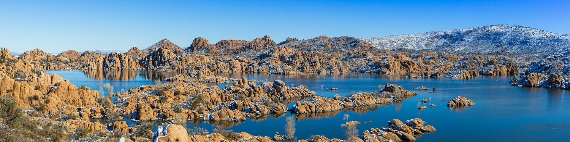 A panoramic winter image of Watson Lake in Prescott Arizona with the Granite Dells taken by a drone.