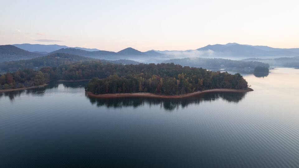 Aerial View of a Foggy Sunrise over Lake Chatuge in the Blue Ridge Mountains