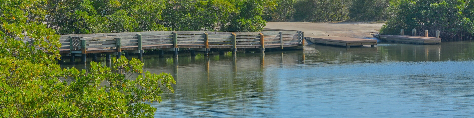 The boat launch and fishing pier in Round Island Riverside Park, on the Indian River, Vero Beach, Indian River County, Florida