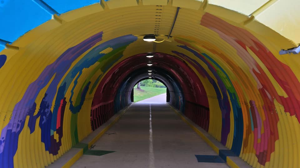 Symmetrical Colorful Abstract Mural Inside Pedestrian Greenway Tunnel