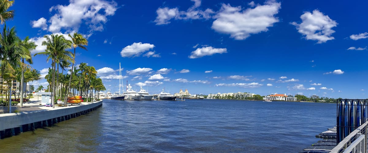 WEST PALM BEACH, FL - FEBRUARY 2016: Beautiful lake with city skyline on a sunny winter day