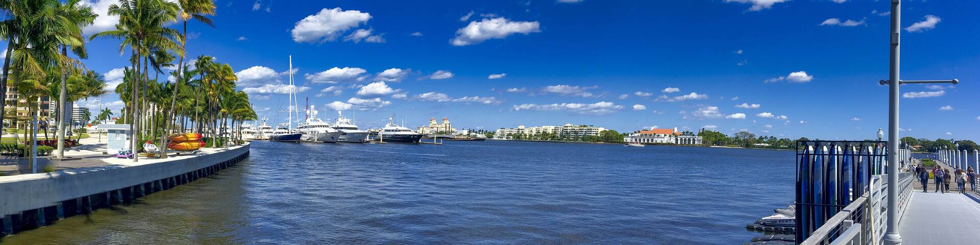 WEST PALM BEACH, FL - FEBRUARY 2016: Beautiful lake with city skyline on a sunny winter day
