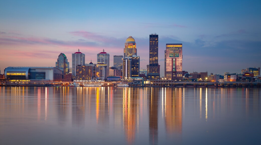 Louisville, Kentucky, USA. Cityscape image of Louisville, Kentucky, USA downtown skyline with reflection of the city the Ohio River at spring sunrise.
