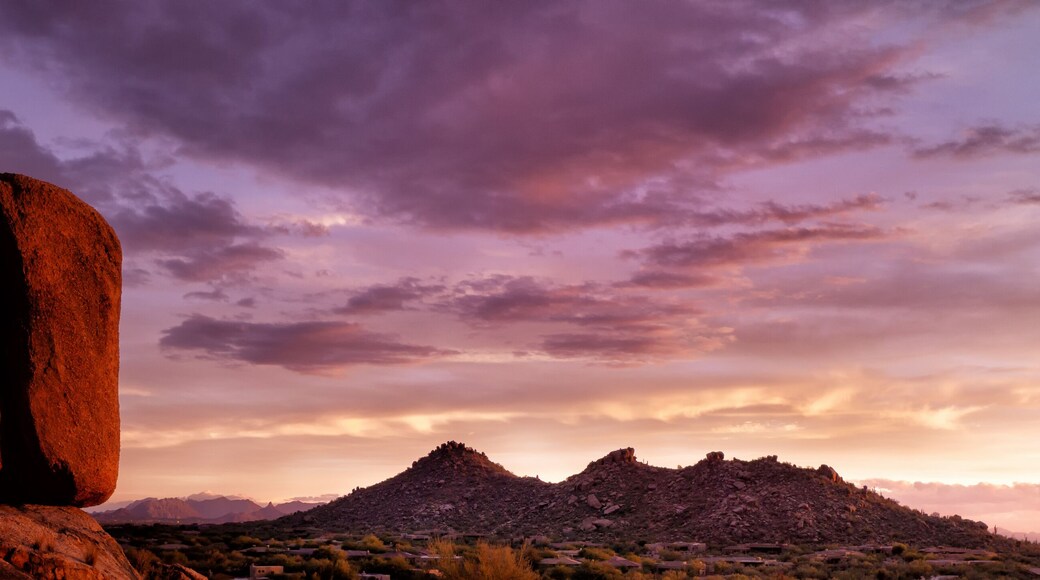 Scottsdale, Arizona, Pinnacle Peak Sonoran high desert vista. Red boulders glow in the last flickers of light before sundown over the Valley of the sun.