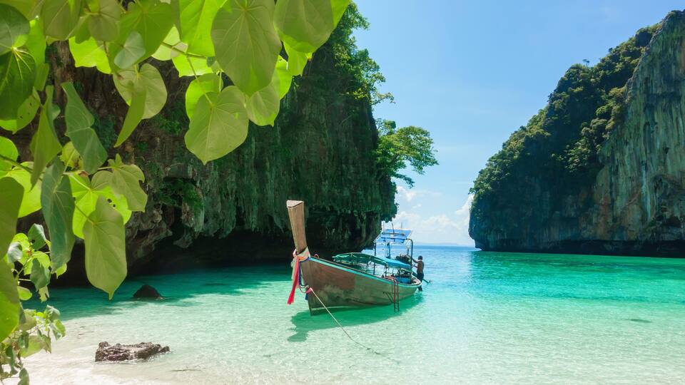Beautiful view landscape of tropical beach , emerald sea and white sand against blue sky, Maya bay in phi phi island , Thailand