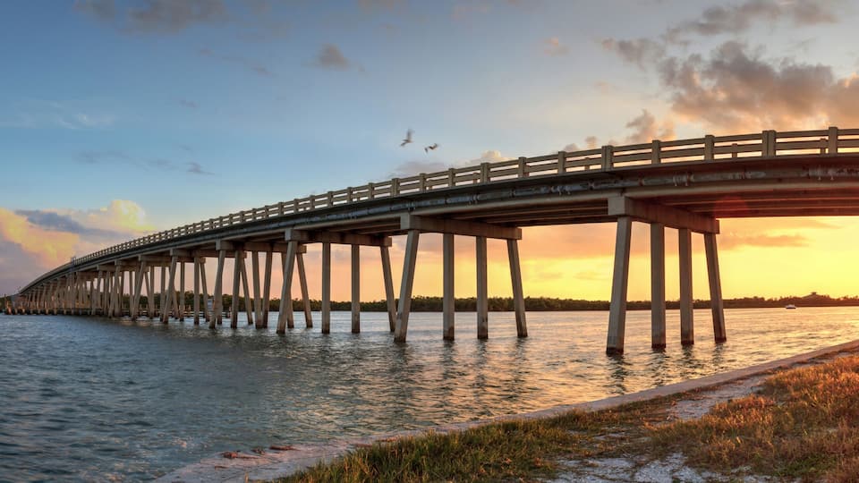 Sunset over Bridge along Estero Boulevard, crossing over New Pass from Estero Bay in Bonita Springs