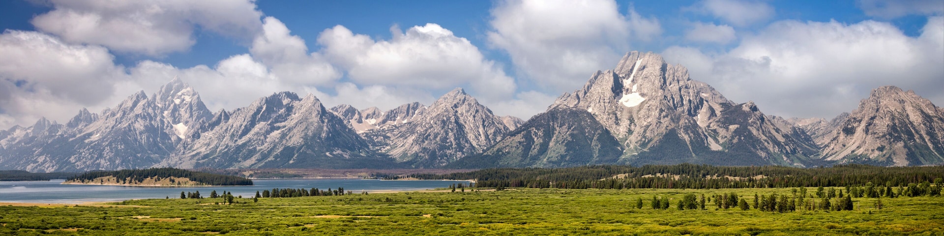 Grand Teton national park, mountain range panorama, Wyoming, USA. Panoramic web banner.