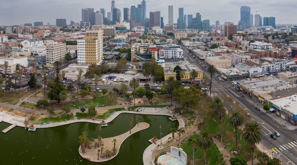 Macarthur Park in Los Angeles, California, USA, offers a green space for recreation and relaxation amidst the urban landscape, with the city skyline in the background.