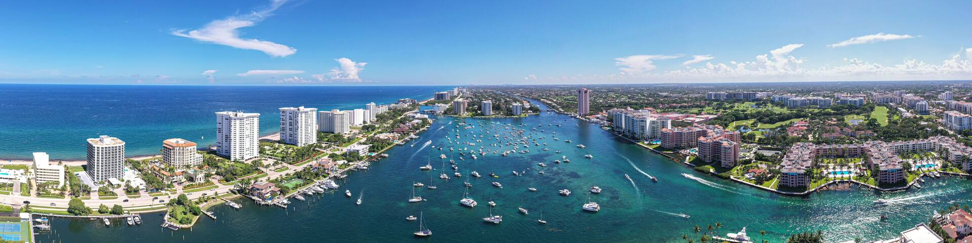 Lake Boca Raton Panoramic Aerial View Florida With Luxury Condos and Boats.