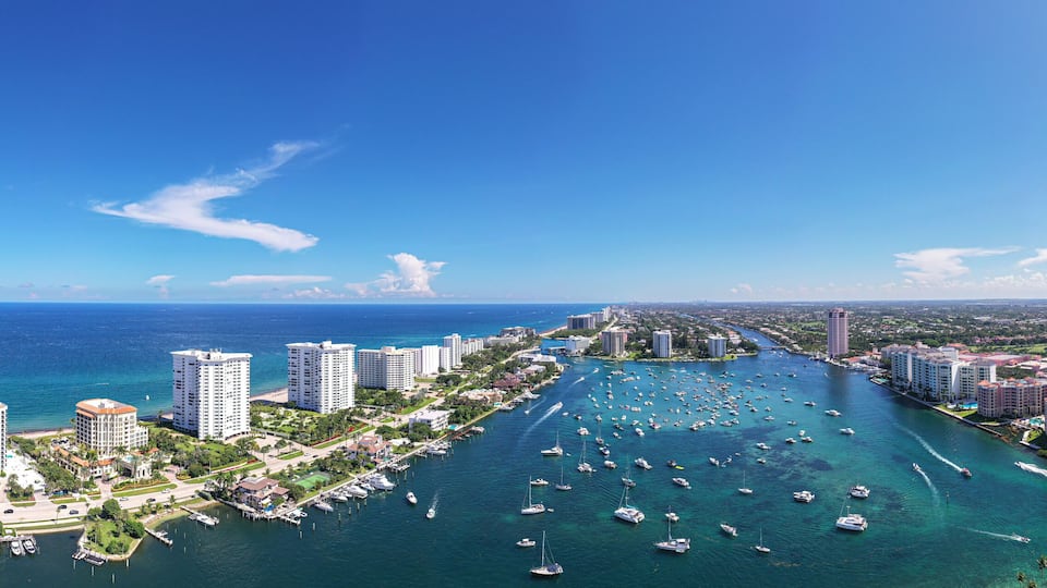 Lake Boca Raton Panoramic Aerial View Florida With Luxury Condos and Boats.