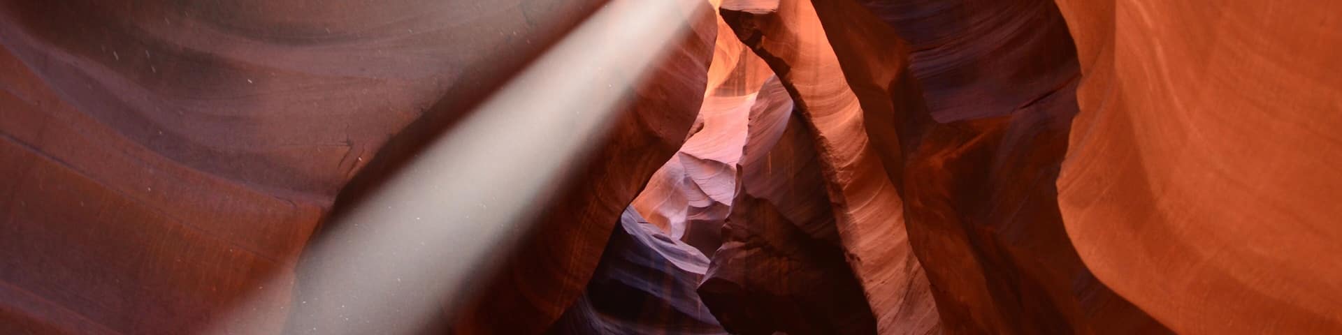 Upper Antelope Canyon near the town of Page in Arizona, beams of sunlight in the middle, prime time, noonday