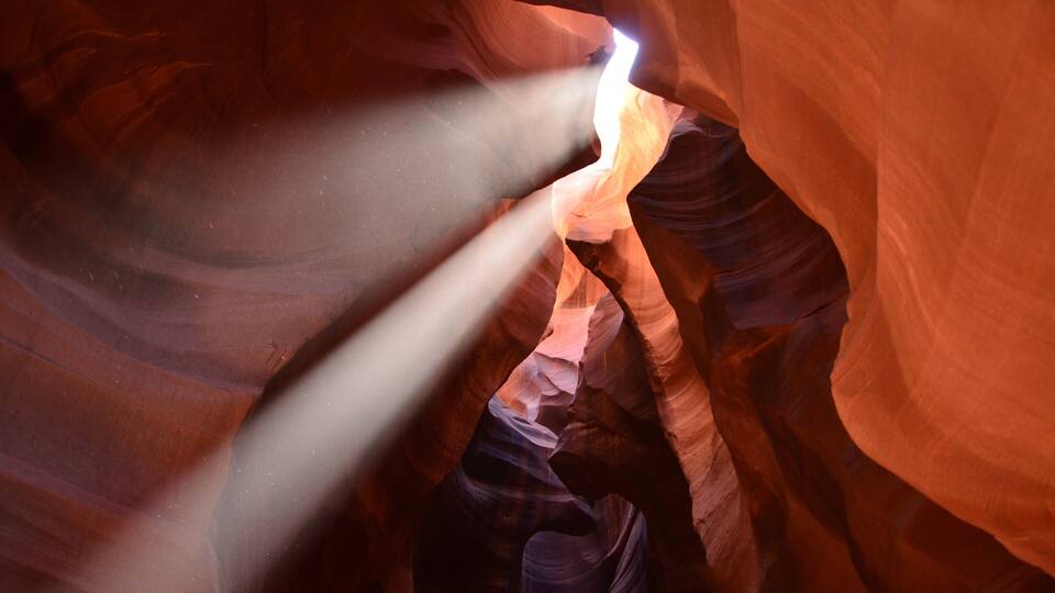 Upper Antelope Canyon near the town of Page in Arizona, beams of sunlight in the middle, prime time, noonday
